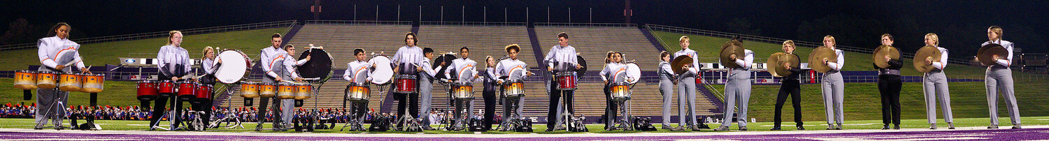 Mineola and Winnsboro percussionists provide the cadence for a full finals retreat before state qualifiers are announced. [see additional area shots]